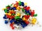 A pile of coloured thumbtacks