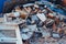 A pile of construction waste near private house. Building rubble, bricks, stones. Junk, garbage piled up near the building. Street