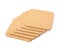 Pile of cork textured coasters isolated