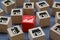 Pile of a cube shape wooden toy blog with franchise business icons store and graph