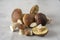 A pile of cut forest mushrooms on a concrete kitchen table. Cep mushroom; Boletus; Borovik.