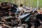 A pile of debris and old broken wooden boards after demolition o