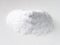 Pile of dextrose crystalline sugar on white