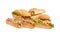 Pile of different hamburgers and hot dog on light background