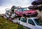 Pile of discarded old cars on junkyard