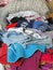 Pile of domestic washing and ironing