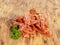 Pile of dried salmon bits on a wooden board