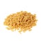 Pile of dry rotini pasta over isolated white background