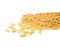 Pile of dry rotini pasta over isolated white background