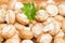 Pile of edible mushrooms on a wooden surface