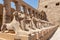 A pile of effigies of rams arranged in a row, Karnak temple, Luxor, Egypt