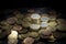 Pile of euro coins with high contrast and bright lighting seen from above