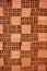 Pile of fired red clay bricks vertical background image