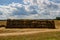 A pile of folded bales of hay