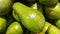 Pile of fresh avocados fruit