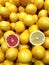 Pile of fresh grapefruits on display at street market