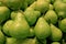 Pile of Fresh Green Anjou Pears in the Market of Santiago, Chile, South America