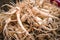 Pile of fresh healthy ginseng sold on a street market in Asia