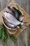 A pile of fresh raw fish on a wooden background. Top view. Carp