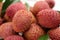 Pile of fresh ripe lychee fruits, closeup