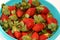 Pile of fresh strawberries fruit, the garden strawberry is a widely grown hybrid species of the genus Fragaria ananassa with its