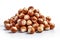 Pile of fresh and wholesome hazelnuts arranged beautifully on clean white surface. nutritional goodness of hazelnuts