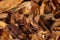 A pile of freshly cut tobacco texture in the background. Closeup