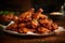 A pile of fried chicken sitting on top of a wooden table