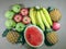 Pile of fruits, Assortment of exotic fruits isolated on grey background. Creative layout made of fresh fruits.