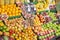 pile of fruits on the shelf of a Colombian market