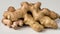 A pile of ginger root on a white background