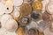 Pile of gold and silber coins on the natural background