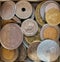 Pile of gold and silber coins in wood box on the natural background