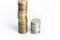 Pile of golden and silver coins stacked in columns. 2 russian rubles coins