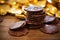 a pile of hanukkah gelt chocolate coins on a light wood surface