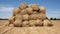 Pile of hay bales in the field