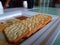 Pile and heap of a rectangle shape Salt Biscuit in a serving plate