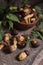 Pile of Imleria Badia or Boletus badius mushrooms commonly known as the bay bolete on vintage wooden background