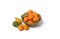 Pile of kumquat in the wooden bowl - white background