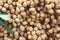 Pile of Longan fruit for sell in street market, Thailand, close up