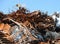 pile of many rusty ferrous scrap in a landfill of a foundry