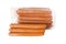 Pile meat flavour sausages in packing
