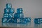 Pile of multiple blue plastic arcylic d6 six sided die dice variable focus