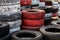 Pile Of Old Used Car And Bike Tyres Representing Hazardous Waste And Material For Recycling Rubber