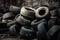 A pile of old used car tires in a junkyard. Generative AI