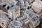 Pile of old used grey concrete bricks  material
