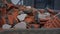 Pile of orange brick debris against construction building