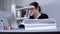 Pile of papers on office table, female employee working on background, workload