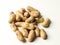 Pile peanuts on white background