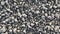 Pile of pebble stones as a background texture pattern